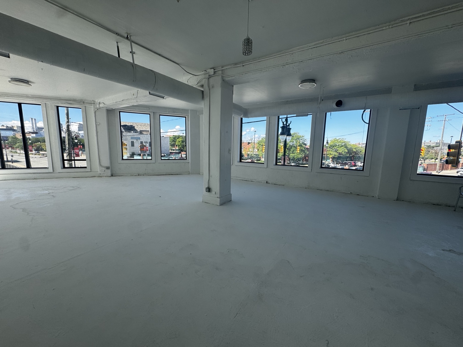 Sunlit wide view of The White Room event space